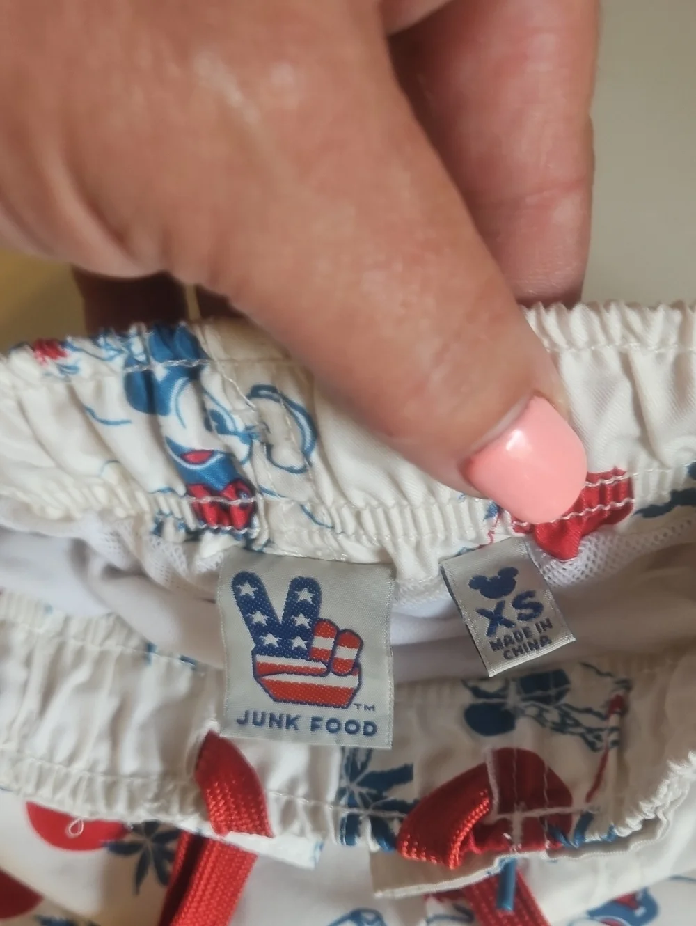 Junk Food Clothing White Swim Trunks with Red & Blue Mickey Print